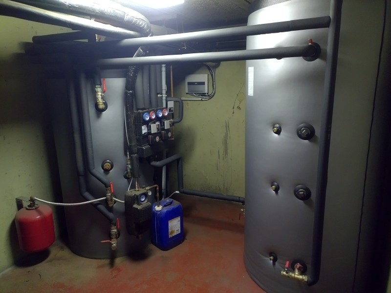 Chauffagiste chaudière proche Yport : Installation d'une chaudière à bûches Easypell en relève d'une chaudière à granulés Okofen